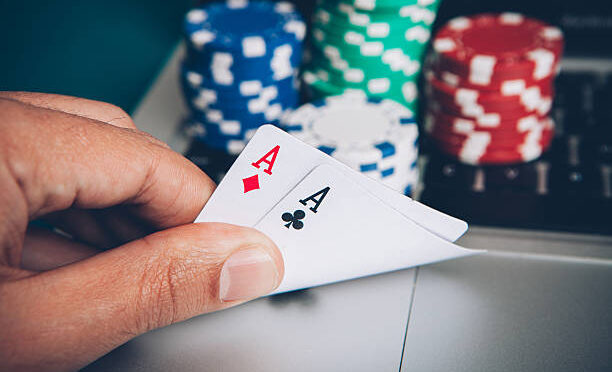 Online play poker hand with two aces