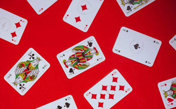 free-photo-of-photograph-of-playing-cards-on-a-red-surface