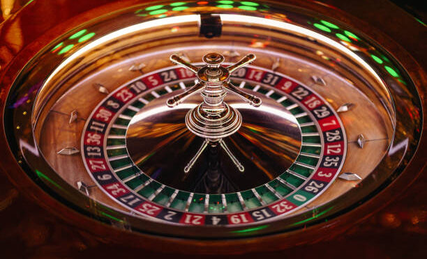 Close up shot of professional roulette spinning wheel in casino